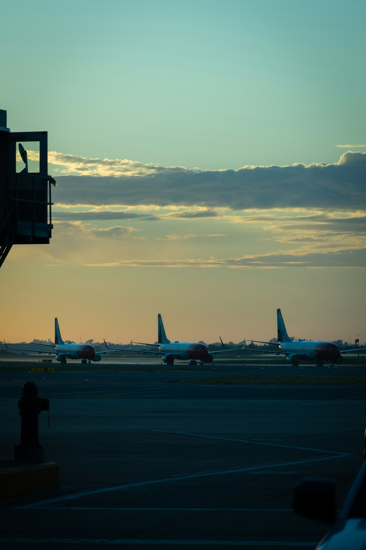 Planes on the tarmac at Ezeiza International Airport at sunset, Buenos Aires, Argentina