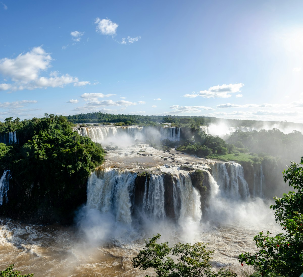 The Garganta del Diablo waterfall at Iguazu, seen from the Argentine walkway with rainbow spray