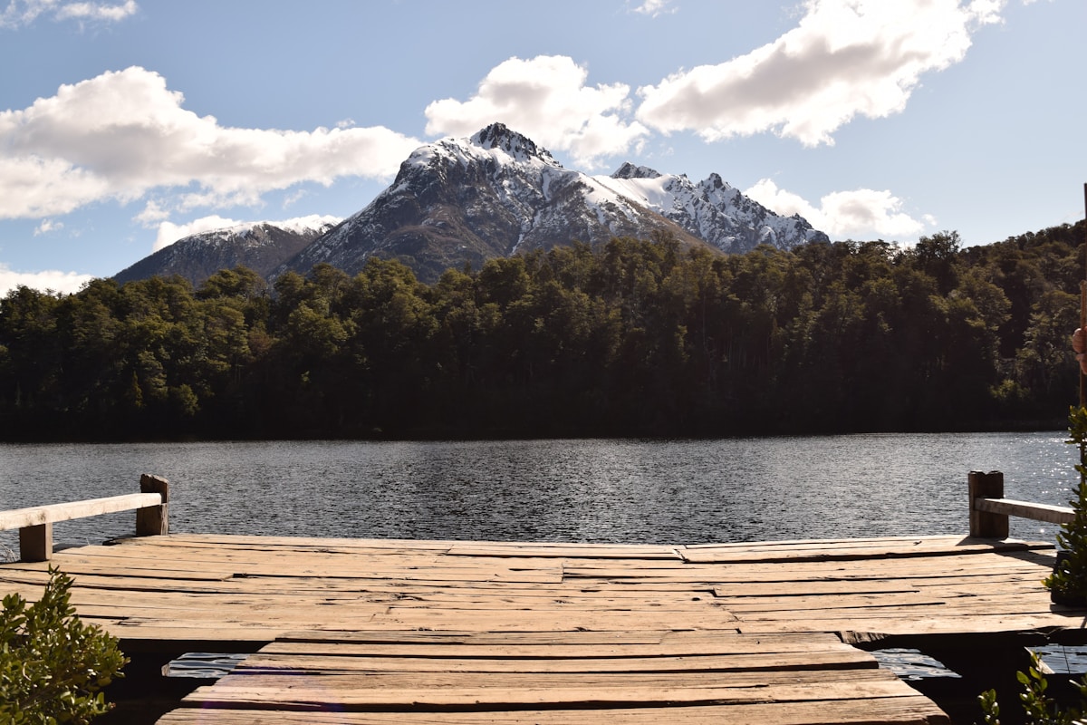 San Martín de los Andes town beside Lago Lácar with forested Andean slopes behind, Neuquén Province