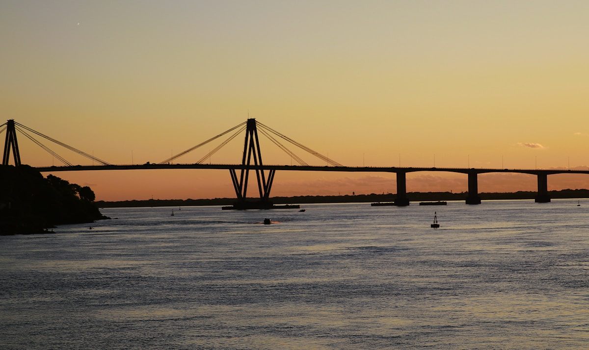 Puente General Manuel Belgrano cable-stayed bridge over the Paraná River at sunset, Corrientes, Argentina