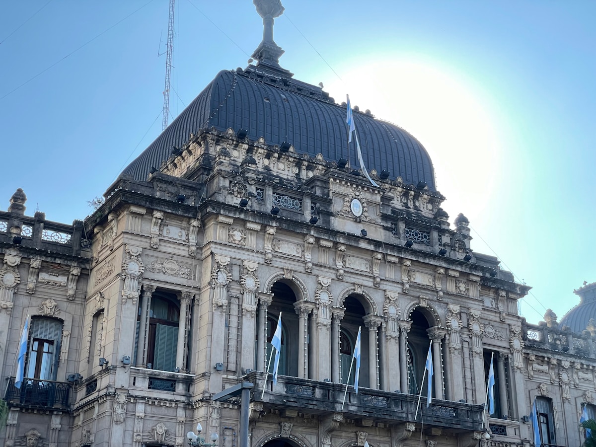 Ornate domed government palace with Argentine flags, Tucumán, Argentina