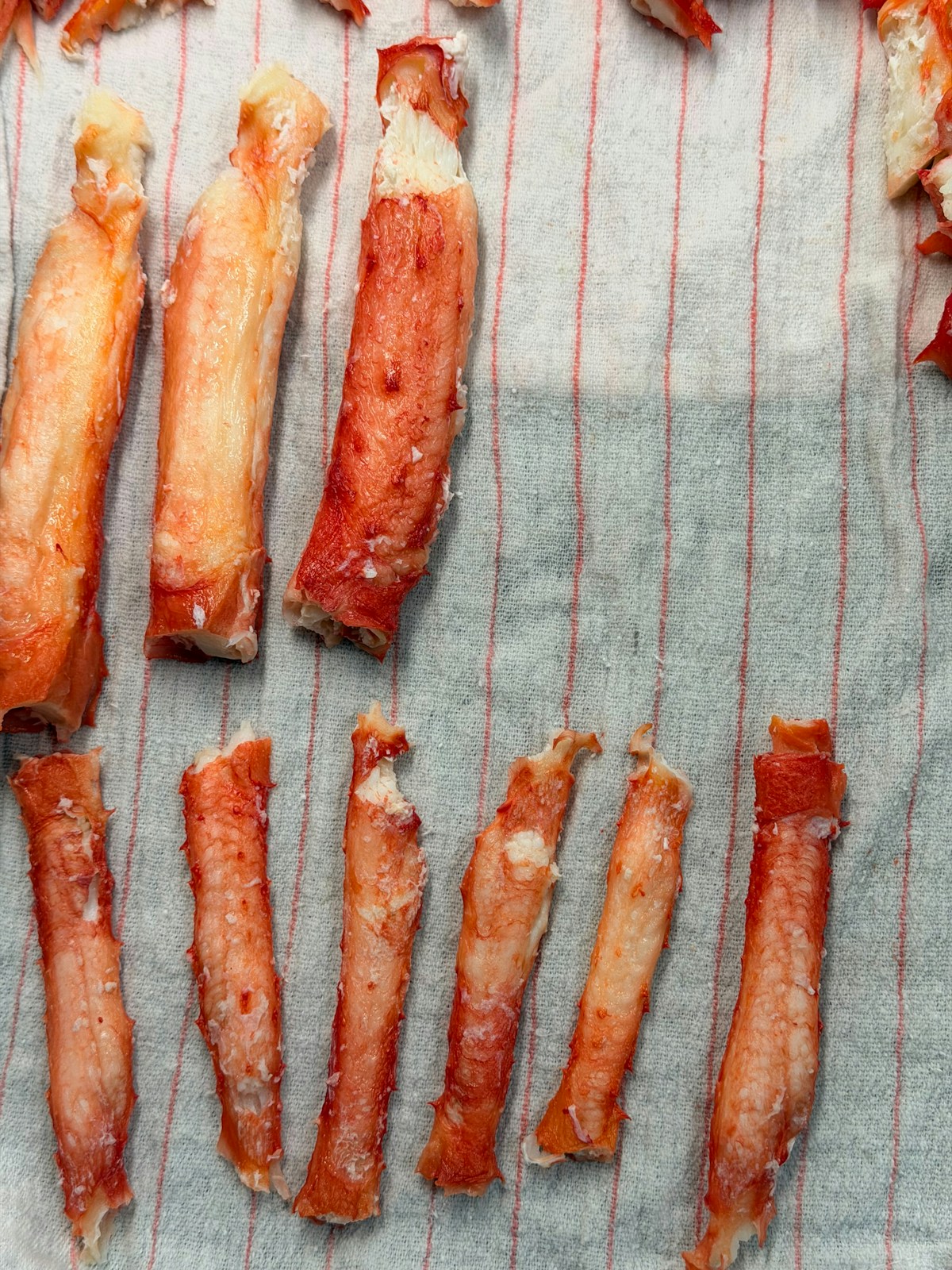 Cooked king crab legs arranged on a cloth — centolla seafood typical of Ushuaia, Patagonia