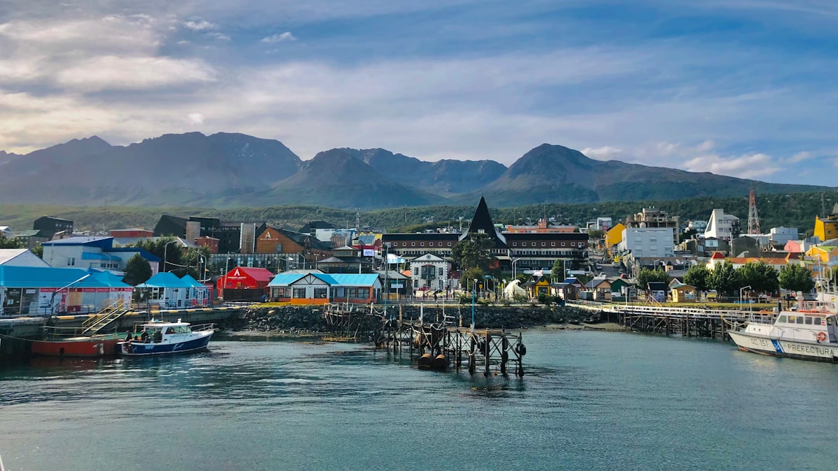 Ushuaia city on the Beagle Channel with the snow-capped Martial Mountains rising behind