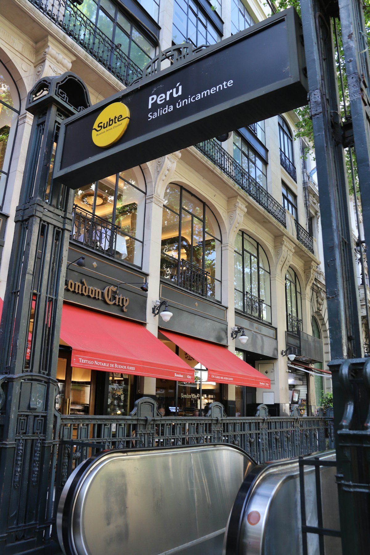 Buenos Aires restaurant street with parrilla grill and outdoor seating