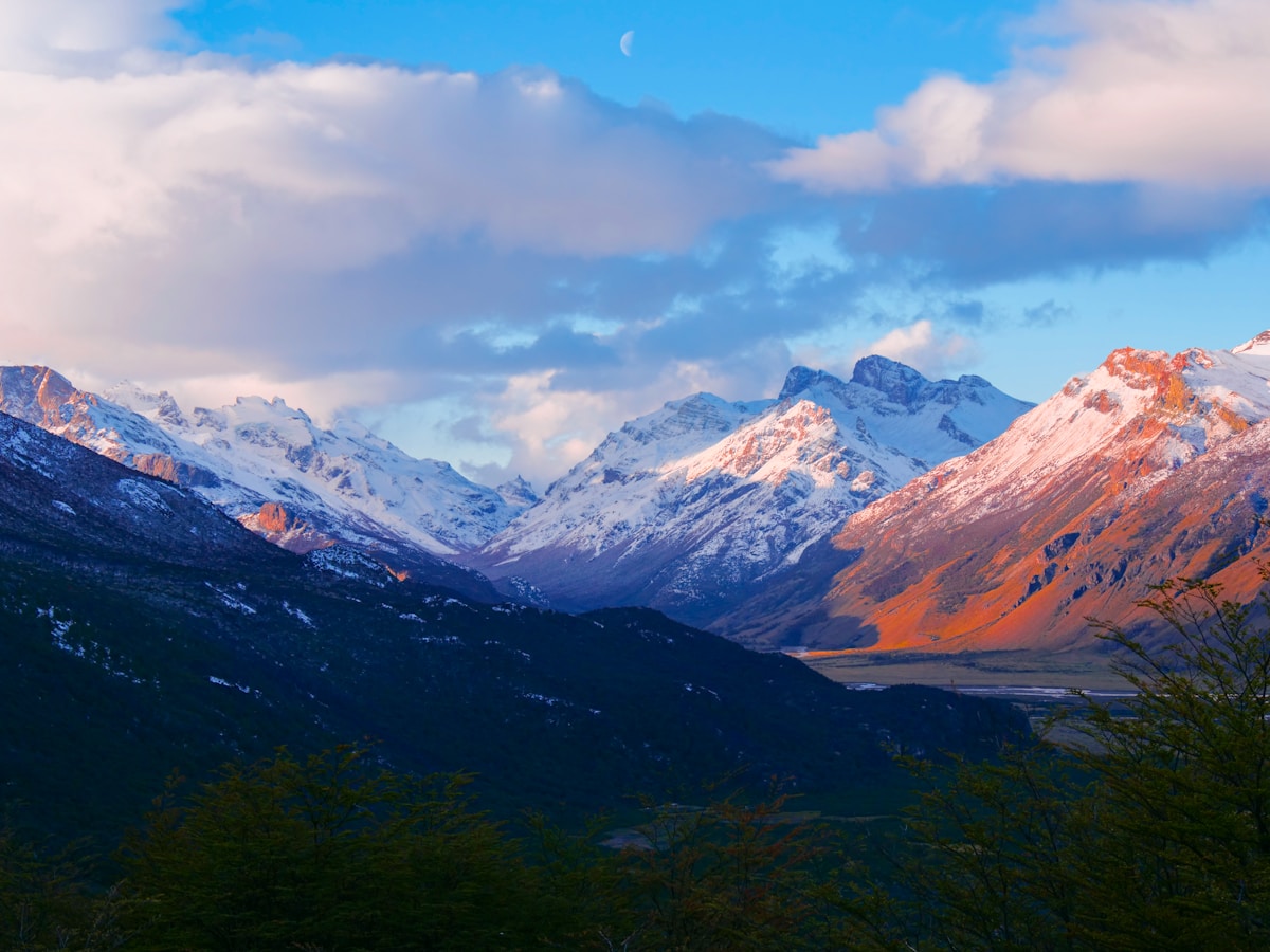 Snow-capped Patagonian peaks at alpenglow near the Fitz Roy massif, Santa Cruz Province, Argentina