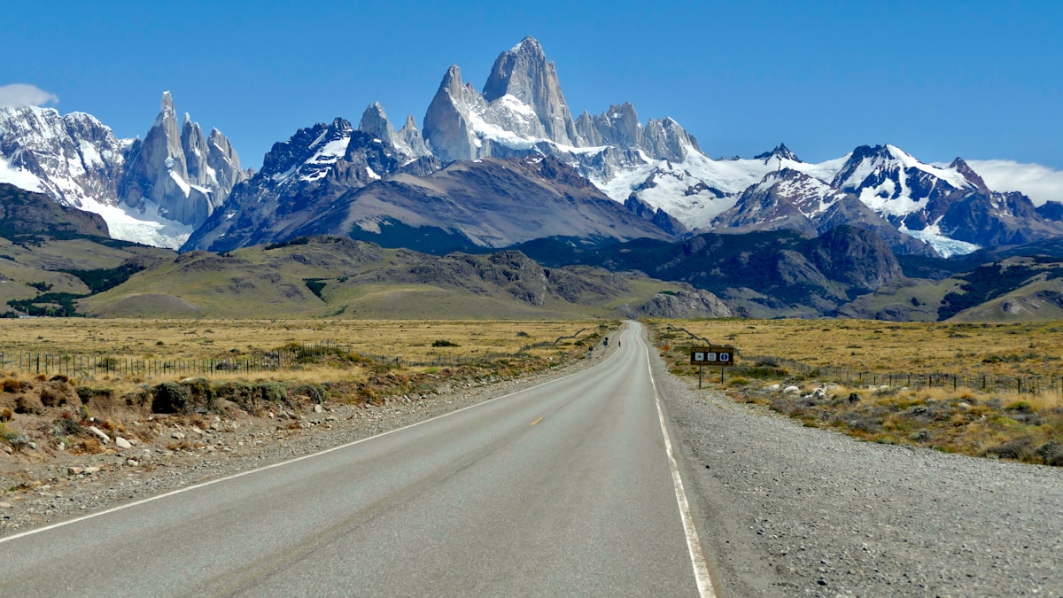 Road leading to the Fitz Roy massif across Patagonian steppe near El Calafate, Argentina