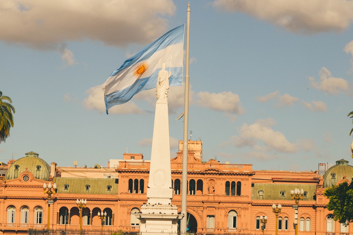 Argentine flag flying in front of the Casa Rosada, Buenos Aires, Argentina