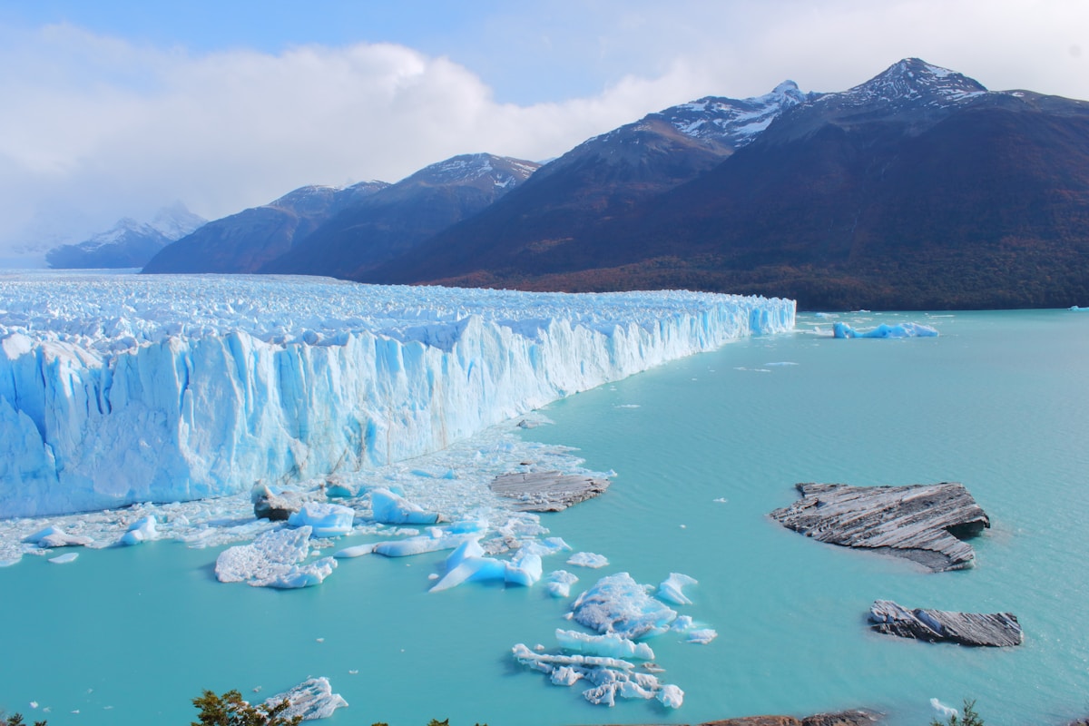 The blue ice face of Perito Moreno Glacier calving into Lago Argentino, Patagonia