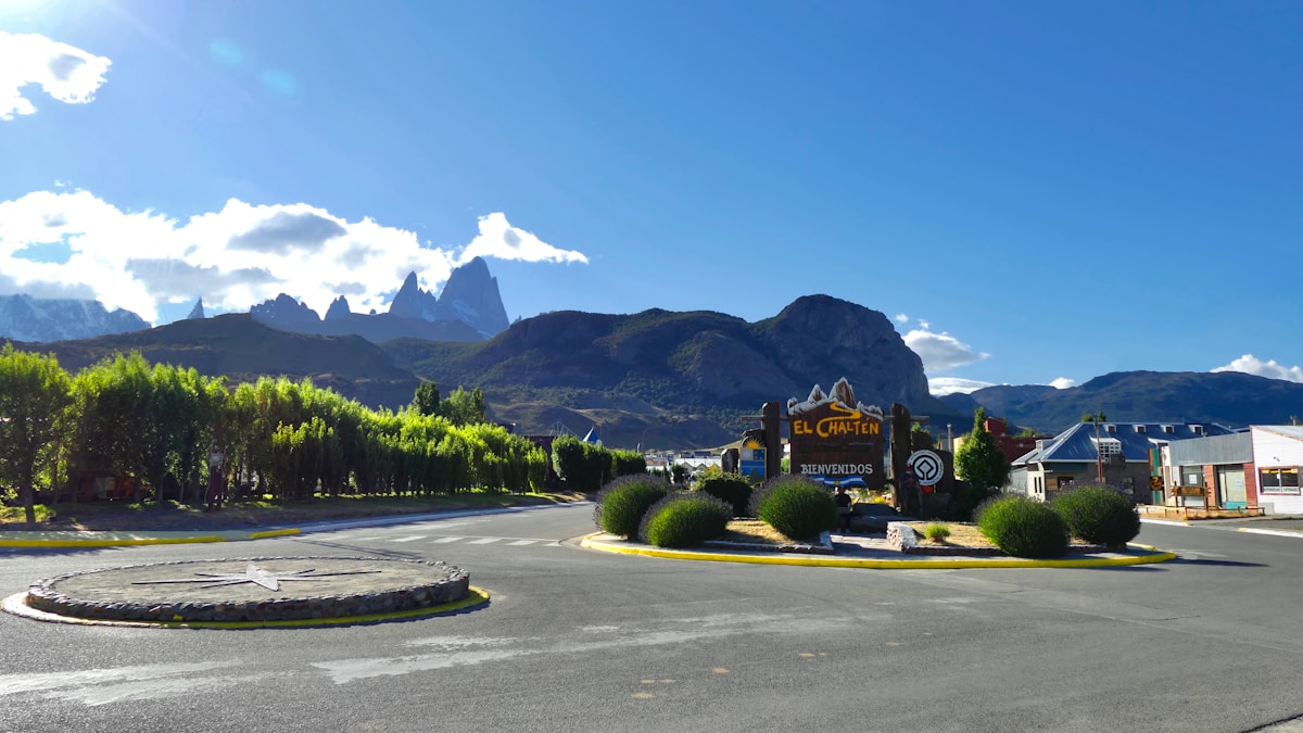 Welcome sign to El Chaltén with Fitz Roy peaks in background, Patagonia, Argentina